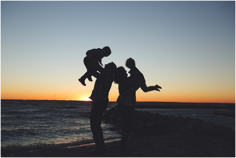 Family of four on the beach in Newport News